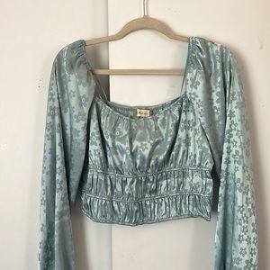 Teal shimmering floral long sleeve top